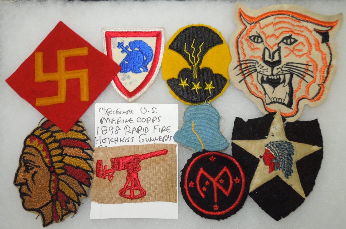 Pre WWII US Army Wool Patch Lot 45th 2nd 27th Divisions: Lot of pre WWII wool insignia to include the early style swastika type 45th Infantry Division, 2nd Infantry Division, 27th Infantry Division, an early 76th Infantry Division bell, 1898 Hotchkiss Machi