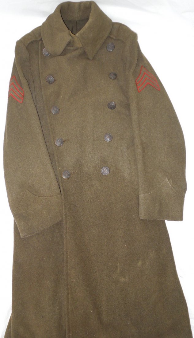 1920s Named USMC Sergeant Overcoat 7th Marines: 1920s Named USMC Marine Corps Sergeant Wool Overcoat 7th Marines Regiment. Named to William J. Hopkins. Hopkins was attached to the 7th Marine Regiment in the 1920s. Size: 2L. Nice Condition. From 192