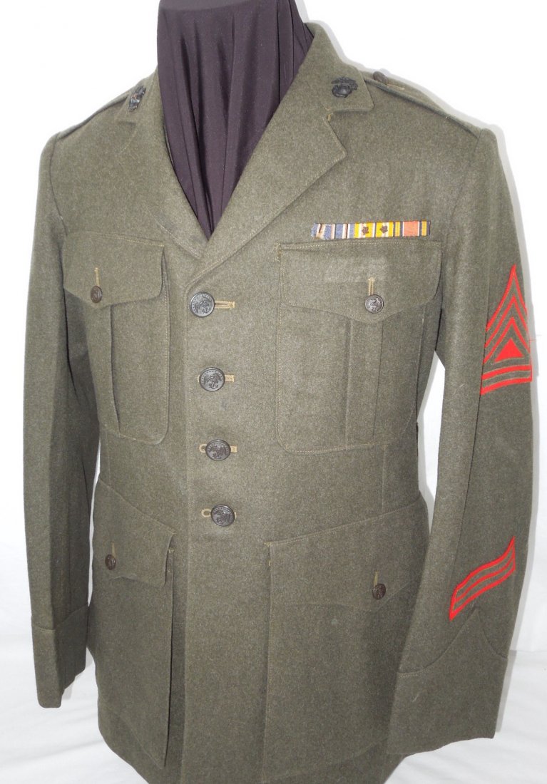 WWII USMC Named 2nd MARDIV Marine Uniform Jacket: WWII USMC Marine Corps Named 2nd MARDIV Marine Uniform Jacket. Named to Gunnery Sergeant Tom Anderson. Theater ribbon bar with (2) bullion stars. The American Campaign Ribbon has damage on the left si
