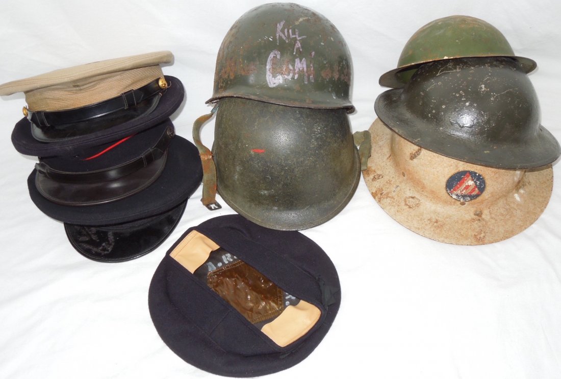 WWII - Vietnam US M-1 Helmets USMC Visor Caps Lot: WWII - Vietnam US M-1 Helmets USMC Visor Caps Lot. You will receive (4) Visors / Caps. 1950s Marine Corp visor is named to R. W. Saylor. The sweat band is loose, 1950s USMC Officer Khaki Visor. On the