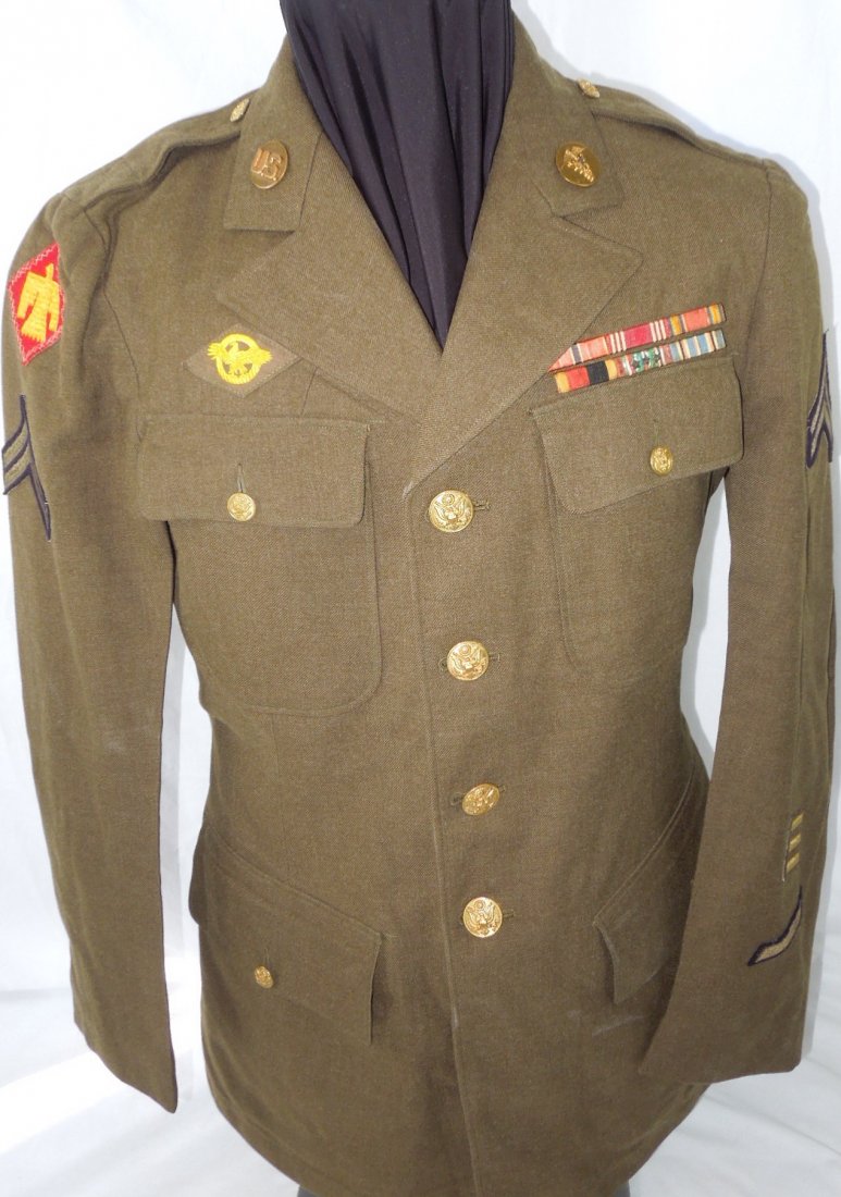 WWII 45th Infantry Div Italian Patch Uniform Jacket BSM: US Army WWII four pocket jacket with an Italian made woven 45th Infantry Division patch chain stitched to the right sleeve, an waxy covered ribbons to include a Bronze Star and an ETO ribbon with camp