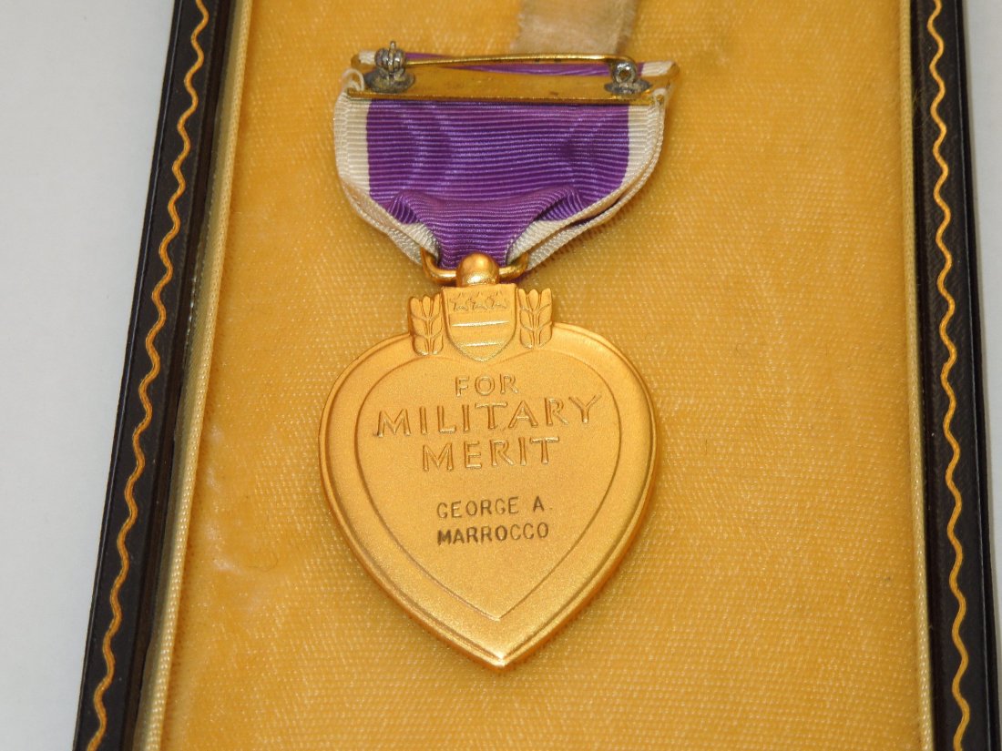 Korean War 7th Infantry Div. KIA MIA Purple Heart Medal: Original WWII produced slot brooch Purple Heart medal issued during the Korean War to Cpl. George A. Marrocco in it's titled case of issue with the medal card. He was a member of the 17th Infantry Reg