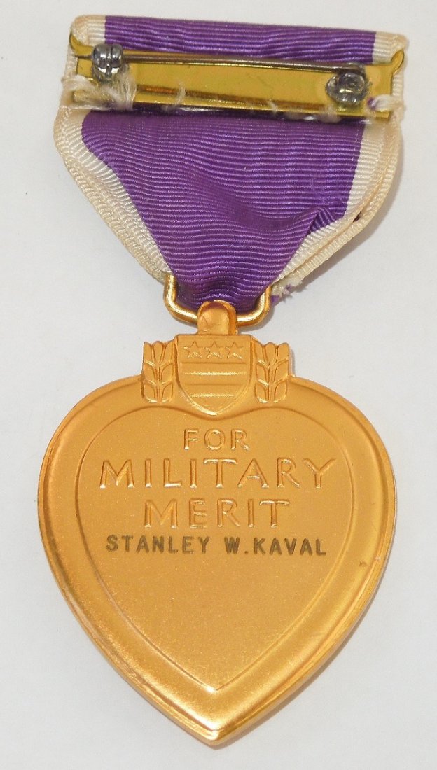 WWII 5th Ranger Battalion Named KIA Purple Heart Medal: Original government issued engraved WWII Purple Heart Medal to Pfc. Stanley W. Kaval of Cook County, Illinois. He was a member of the 5th Ranger Battalion, made the landing on D-Day and fought his way