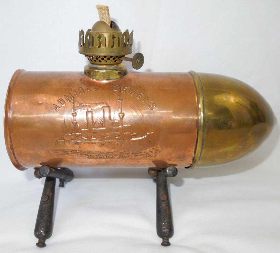 SAW Admiral Dewey Remember the Maine Oil Lamp: Spanish American War SAW Admiral Dewey Remember the Maine Oil Lamp. Admiral Deweys Lamp with the slogan Remember the Maine on one side, a depiction of a battleship USS Maine on the other. Measures app