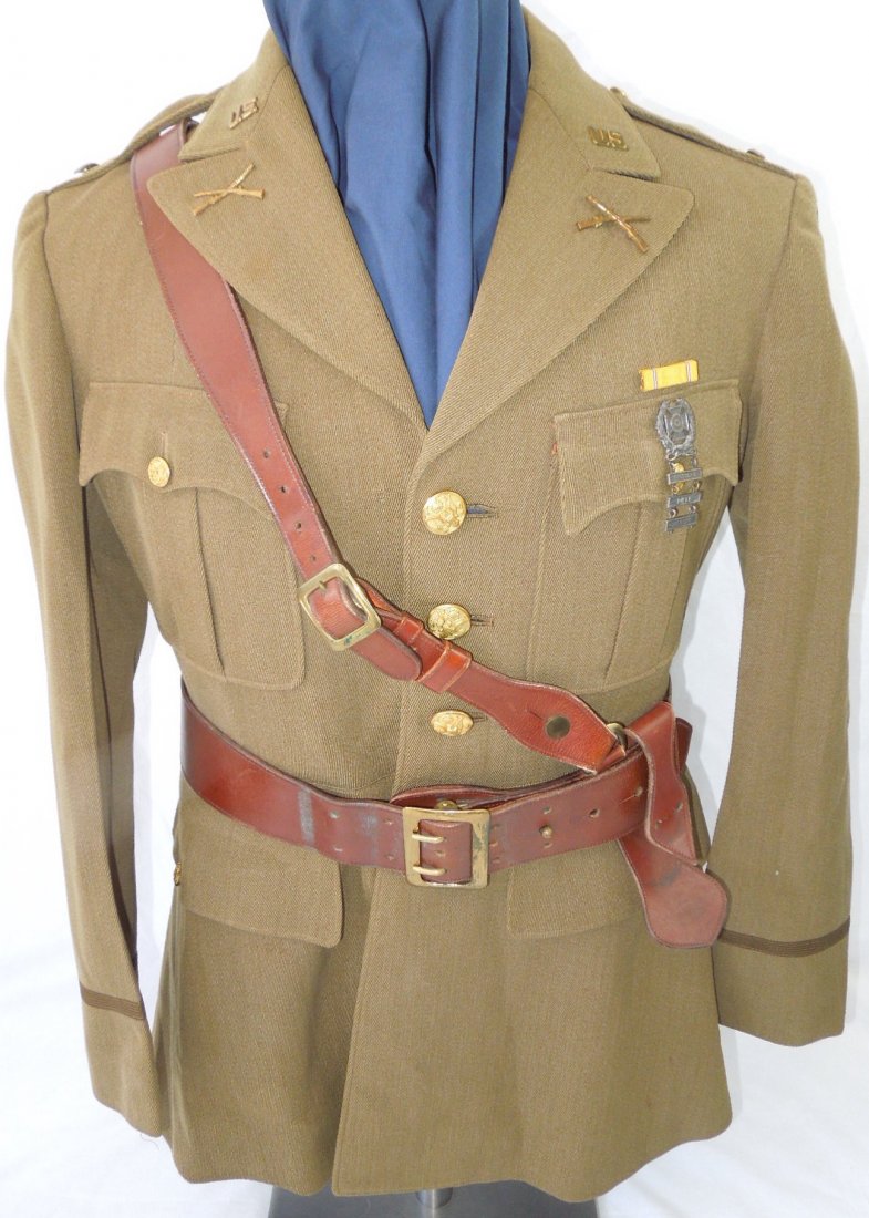 Named US Third Service Command Officer Uniform & Belt: January 1934 dated US Army 2nd Lieutenant uniform jacket named to H. Walker, and featuring a Third Service Command patch, rank bars, sterling marksmanship badge, American defense ribbon, and a nice le