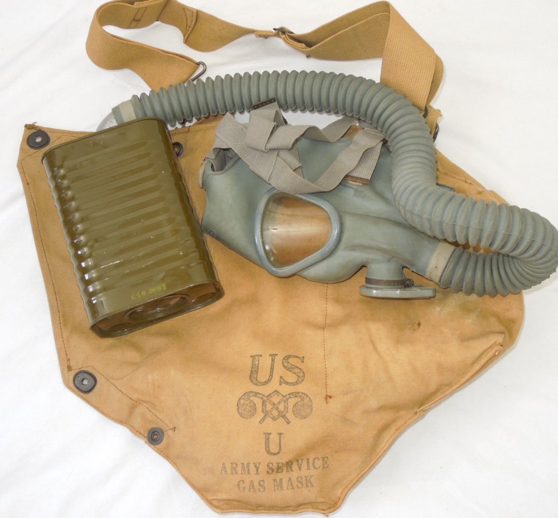 WWII US Army Diaphragm Gas Mask and Bag: US Army Service Gas Mask and Bag. Stamped on the inside of the bag is MIVA1B250-1. The rubber mask and tube are still very flexible. The canister is marked FT250-2 and is in excellent shape. (III B 21