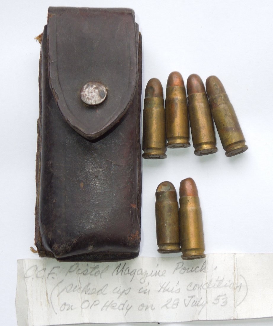 Korean War Captured Chinese Magazine Pouch and Bullets: Note: This lot can only be shipped to a United States Mailing Address via UPS. Captured Chinese Communist Forces CCF magazine pouch containing six 7.65 x 25 Tokarev pistol rounds, unfired, with one be
