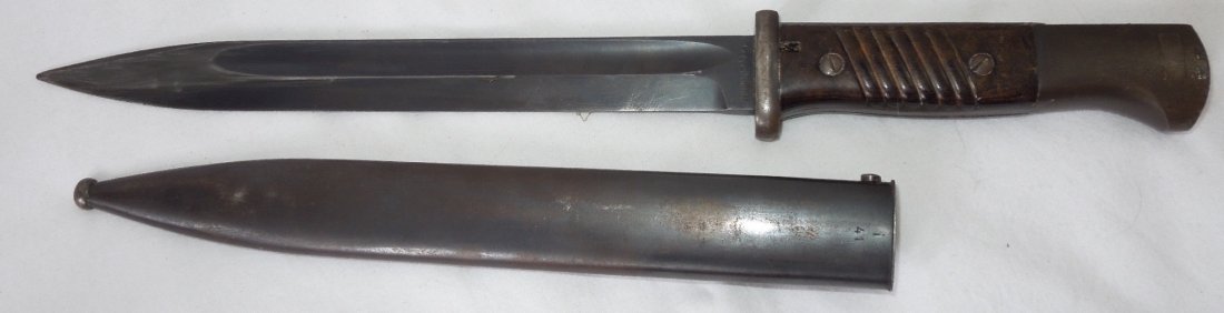 WWII German K98 Bayonet and Scabbard 1939: Original non matching number German Wehrmacht K98 bayonet and scabbard. Bayonet is 1939 dated and made by Goppel, and the scabbard is 1941 dated.