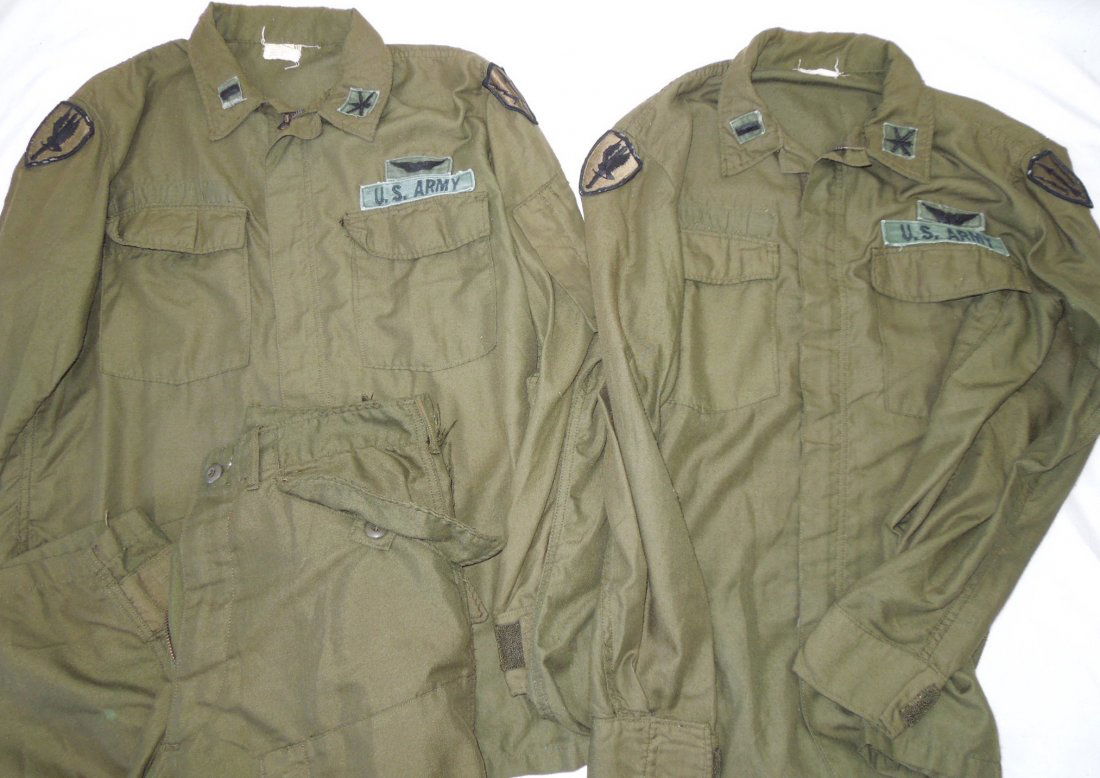 1971 Vietnam US Army Officer Pilot Flight Uniforms: US Army Vietnam Era Pilots set of (2) zippered shirts and 1 pants. 1st Lieutenant shirts with Air Defense Command and Army Brigade 1st Aviation Company Eagle Sword Insignia Patches, wings, Air Defense