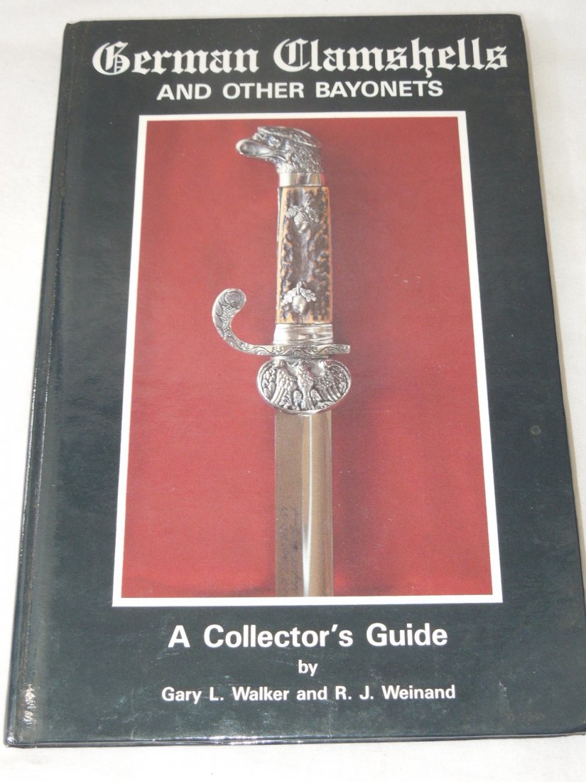 German Clamshells Bayonets Book Signed Weinand: German Clamshells and Other Bayonets: A Collectors Guide, by Gary L. Walker and R.J. Weinand, 158 pages B&W, hardcover, 1985, First Edition hand signed by both authors.