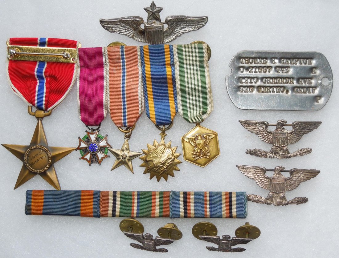 WWII 8th AAF Liaison Pilot Colonel Medal Wings Tag Lot: Group it items from Col. Thomas K. Hampton who served in 8th Air Force in the European Theater of Operations (ETO) after his stint with the 6th Air Force where he made Lt Col and was placed in command