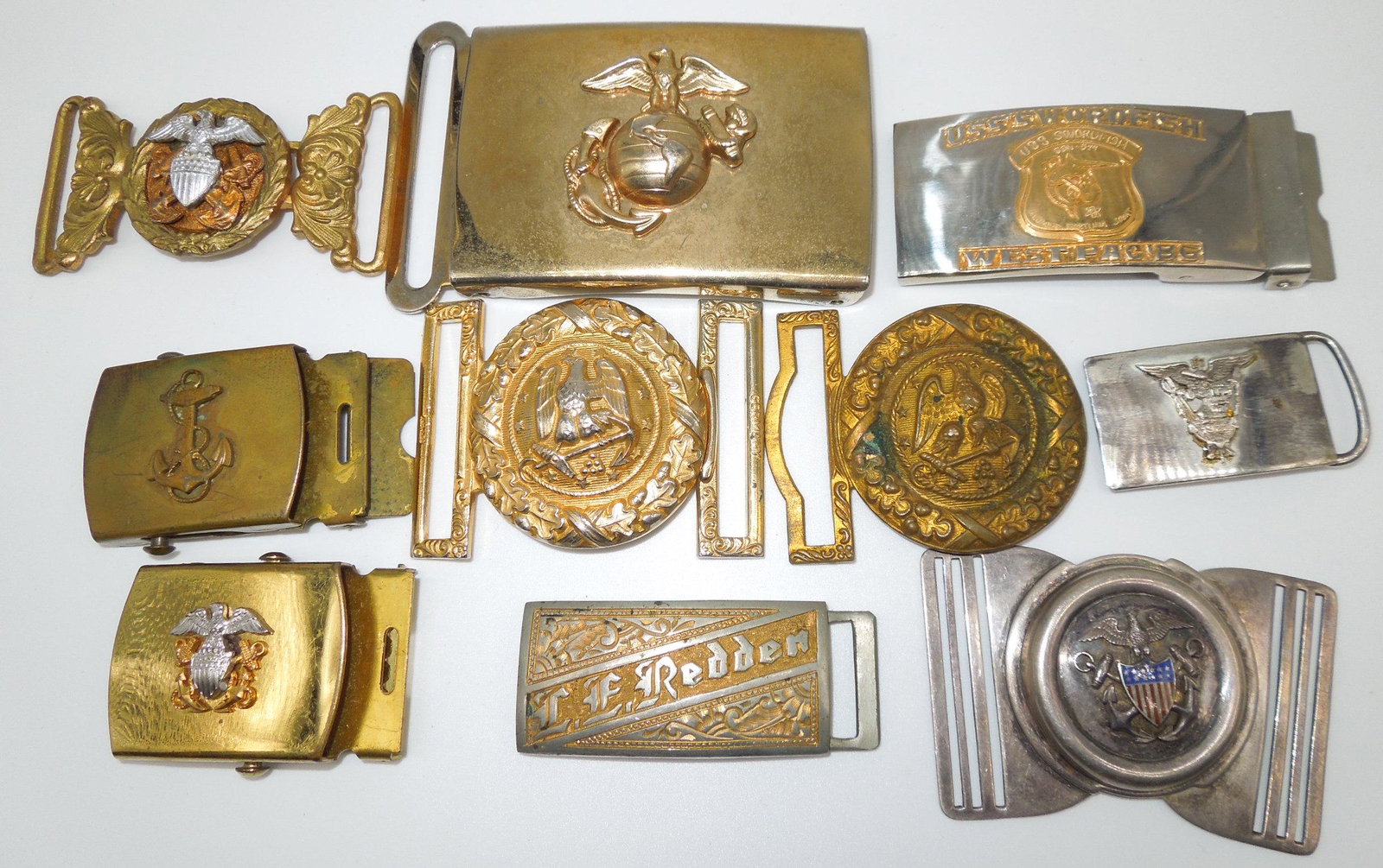 Navy, Marine Corps, Naval Academy Belt Buckle Lot of 10 Sterling: Navy, Marine Corps, and Naval Academy Belt Buckle Lot of 10. You will receive the following: Marine Corps belt buckle marked Officer Equipment Company, Navy Officer Shield belt buckle marked Sterling 