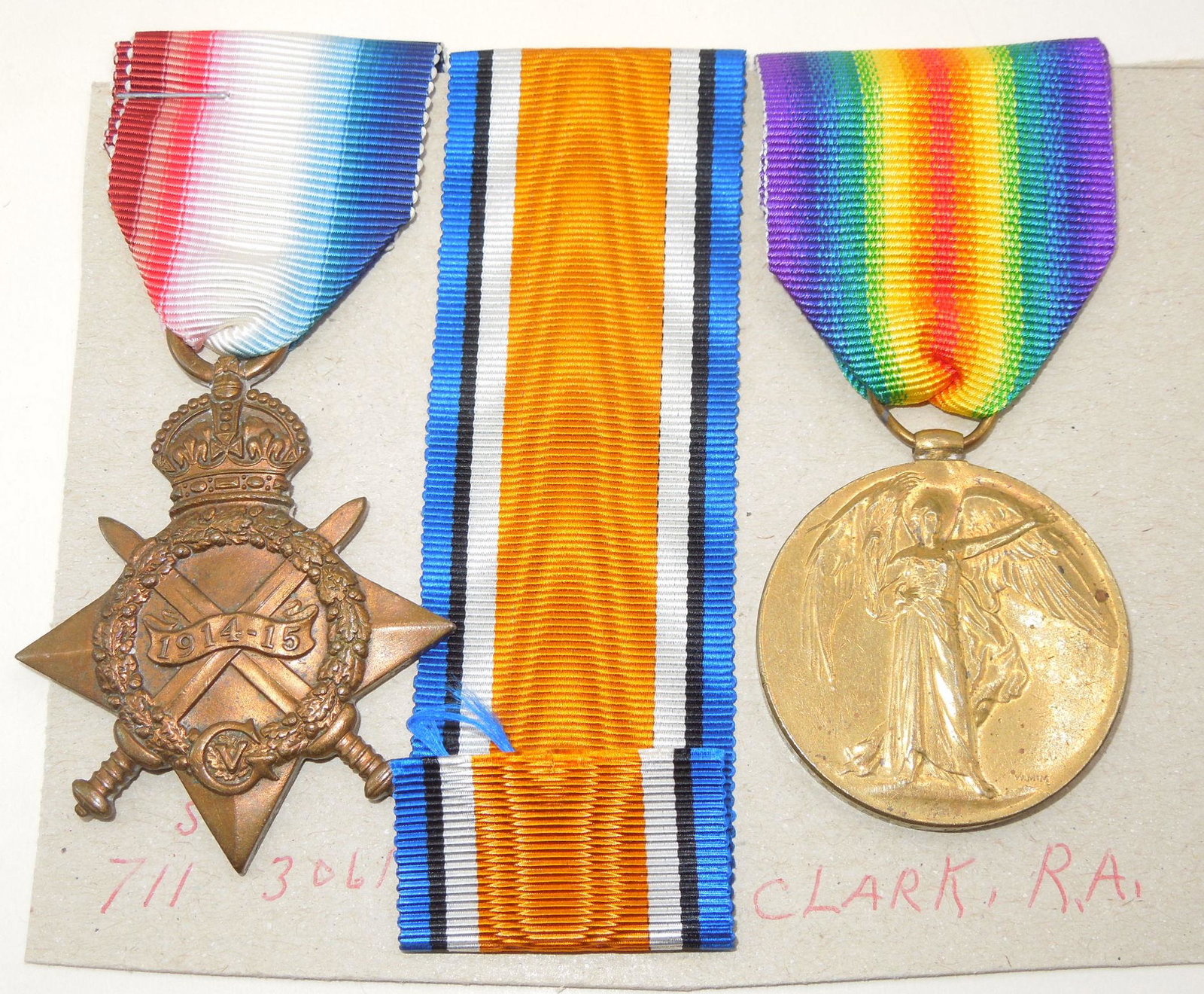 WWI Named British Gunner Lot 1914-15 Star, Victory Medals & Ribbon: WWI Named British Gunner Lot 1914-15 Star, Victory Medals & Ribbon. Named to : F. Clark. You will receive the following medals. 1914-1915 Star Campaign medal (on reverse: 711 GNR: F. Clark R.G.A.), WW