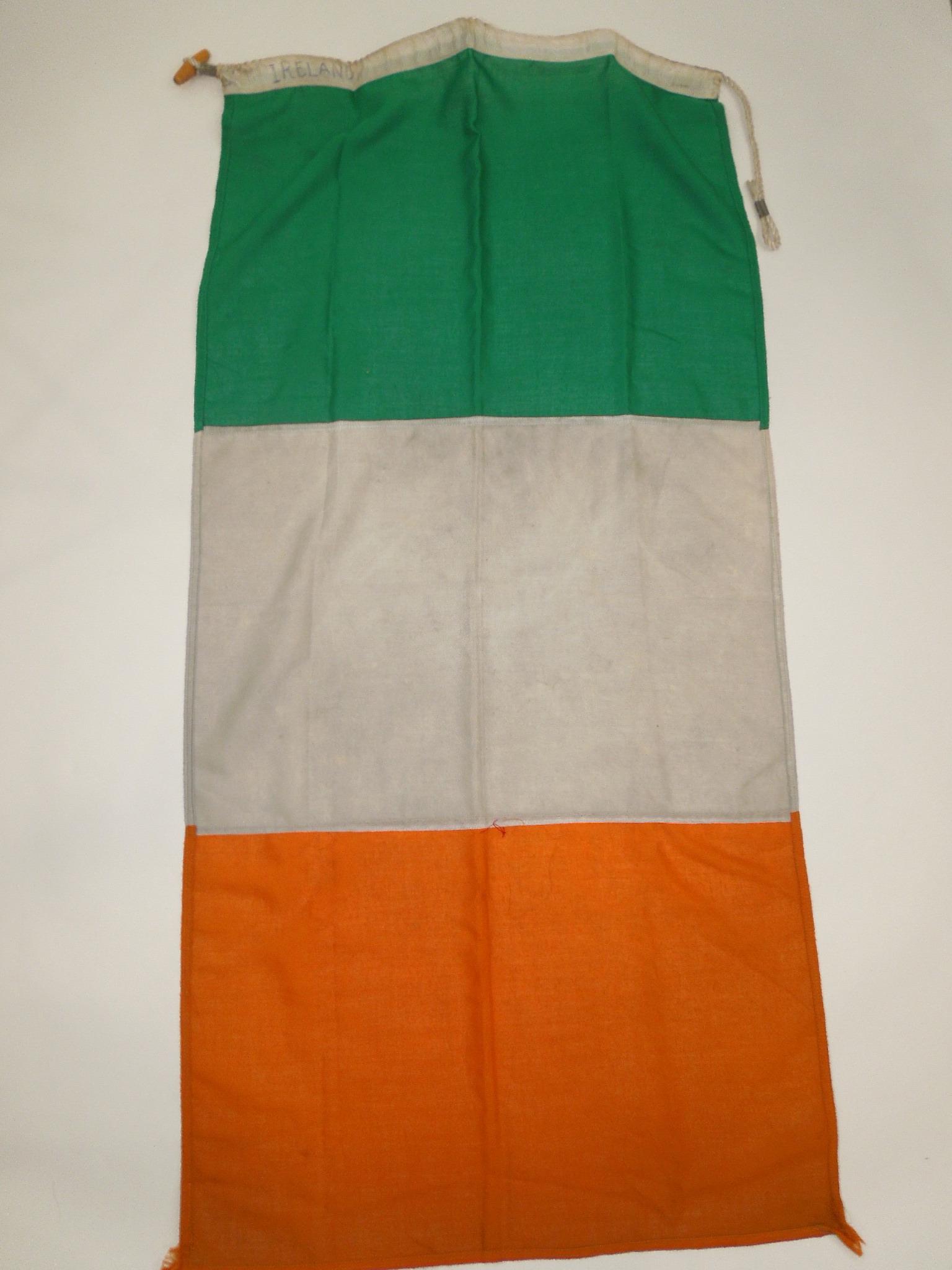 Vintage Ireland Sea Ship Merchant Vessel Flag: Ireland Boat Ship Cloth Flag. Stitched cloth with canvas header, grommets and rope. Approximate size is 26 x 52 inches. Good condition for being used.