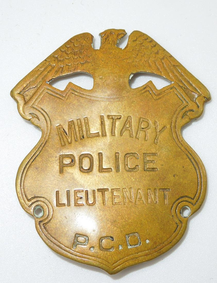 1930s - 1940s Panama Canal Depot Military Police MP Lieutenant Badge: Original vintage MP Lieutenant Panama Canal Department theater made Police badge as shown. Minor wear from age and use throughout; Not maker marked; Good condition but pin is bent.
