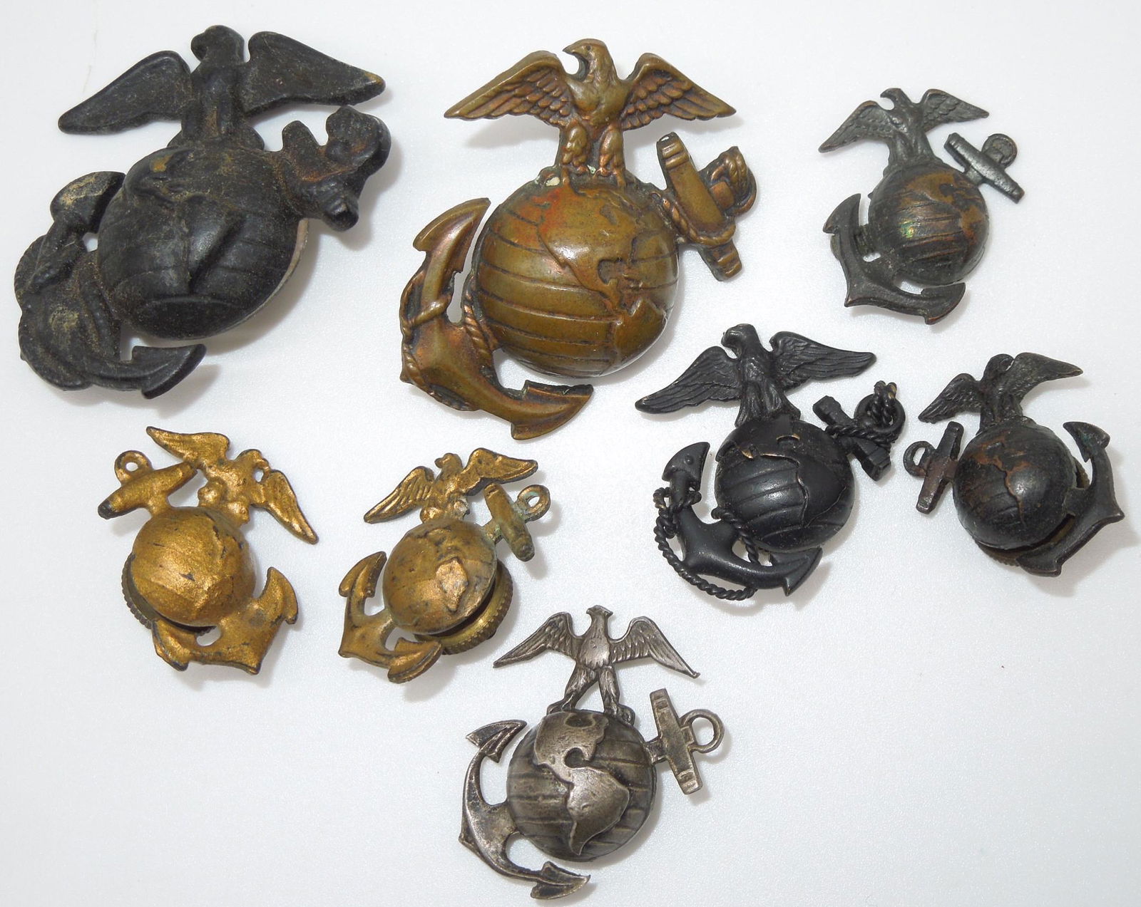 Lot of 8 WWII - Vietnam USMC EGA Badges (1 of 6)