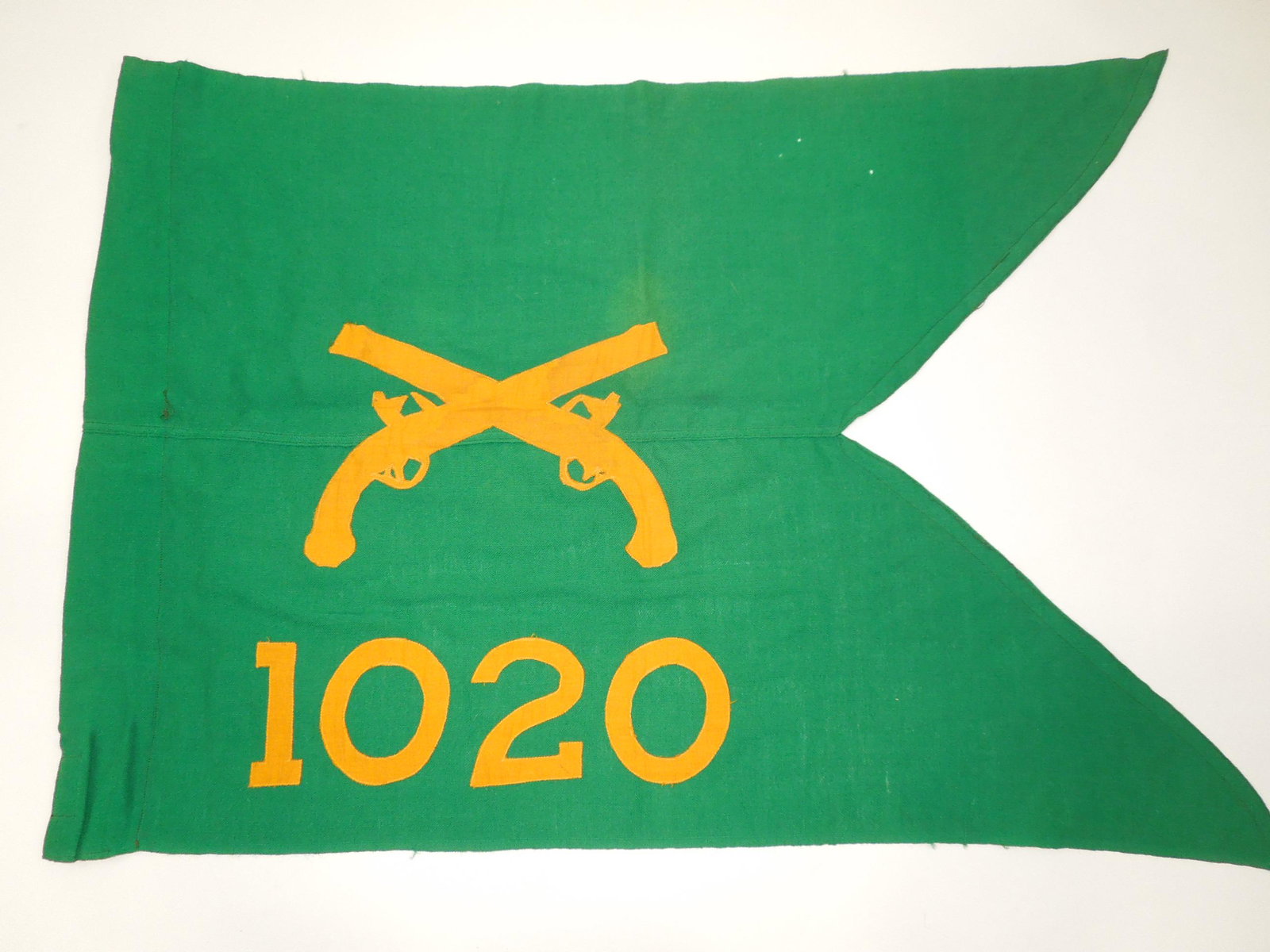 WWII Philidalphia QM 1020th Military Police Guidon Flag: Original WWII produced 1020 MP guidon with a Philadelphia Quartermaster label inside. It measures approximately 20 inches by 29 inches, and has a few scattered moth holes.