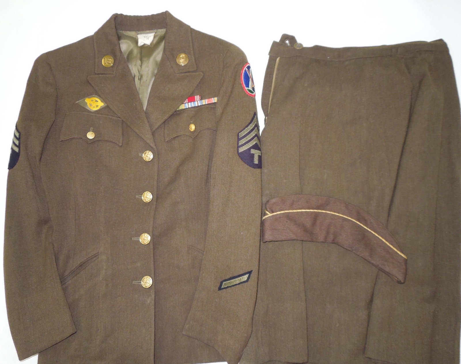 WWII Named WAC Womens Army Corps Uniform, Skirt & Cap: WWII named Womens Army Corps uniform jacket- Military District of Washington with period ribbons, patches, skirt, and garrison cap. Named to Waugh. All pieces are in good condition.