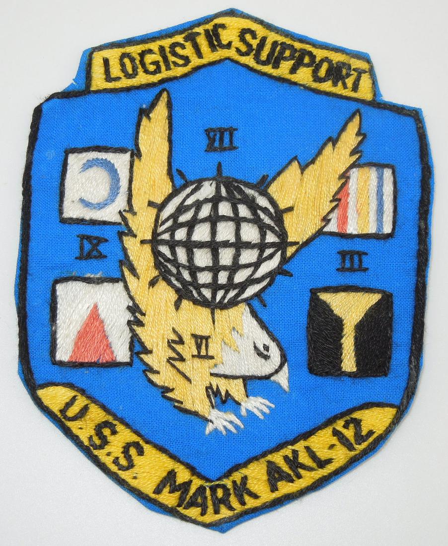 Vietnamese Theater Made USS Mark AKL-12 Logistic Support Patch: Vintage US Military patch as shown. It has some paper and glue residue on the back. This came out of a large collection from a USMC, USCG, and USN collector who picked up most of his items in the 1960