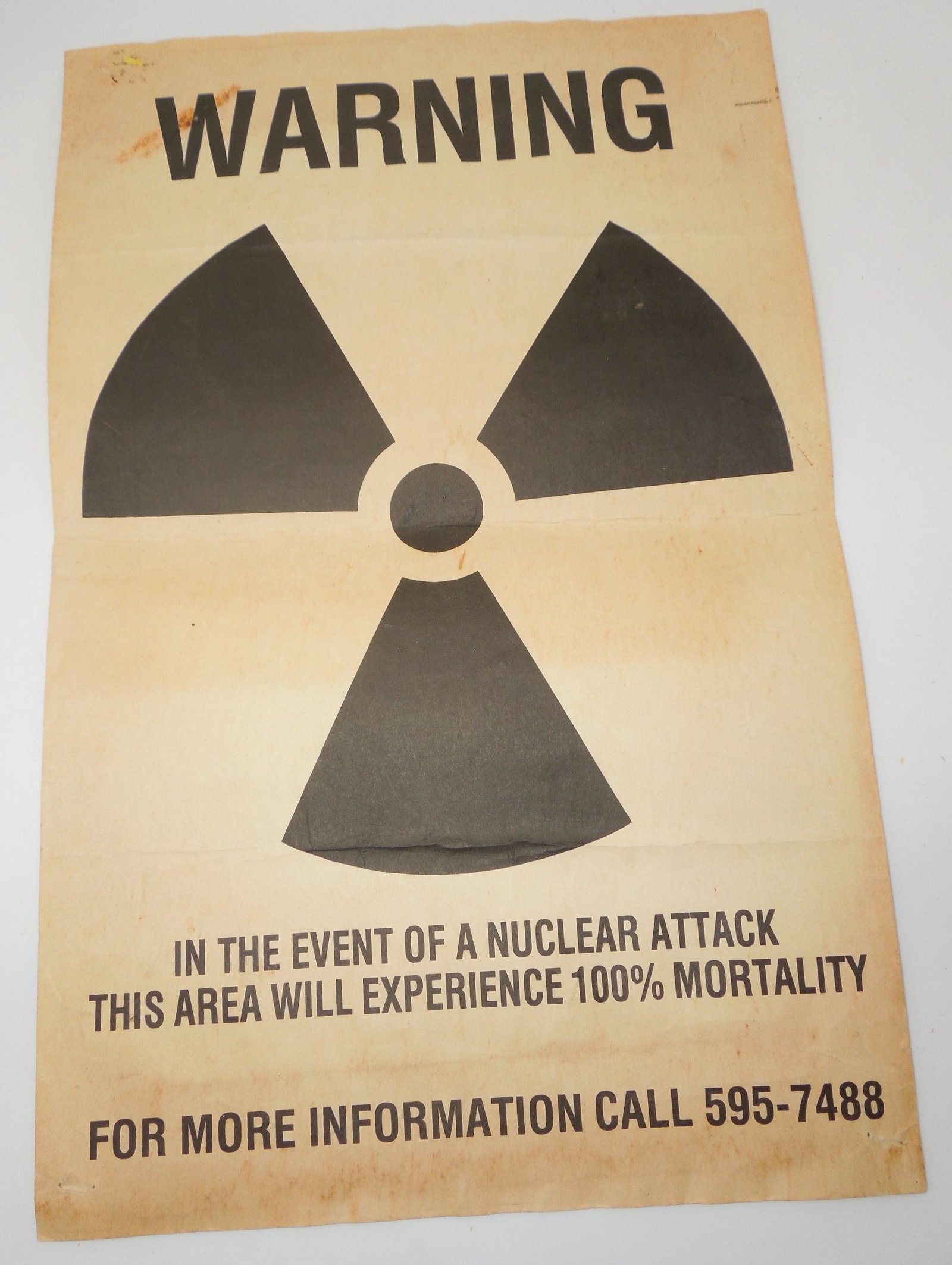 Cold War Nuclear Attack Mortality Paper Warning Sign Poster: Cold War Nuclear Attack Warning Sign Poster. Approximate Size is 11 x 17 inches. The condition shows signs of wear, staple holes, creases and faded foxing from age.