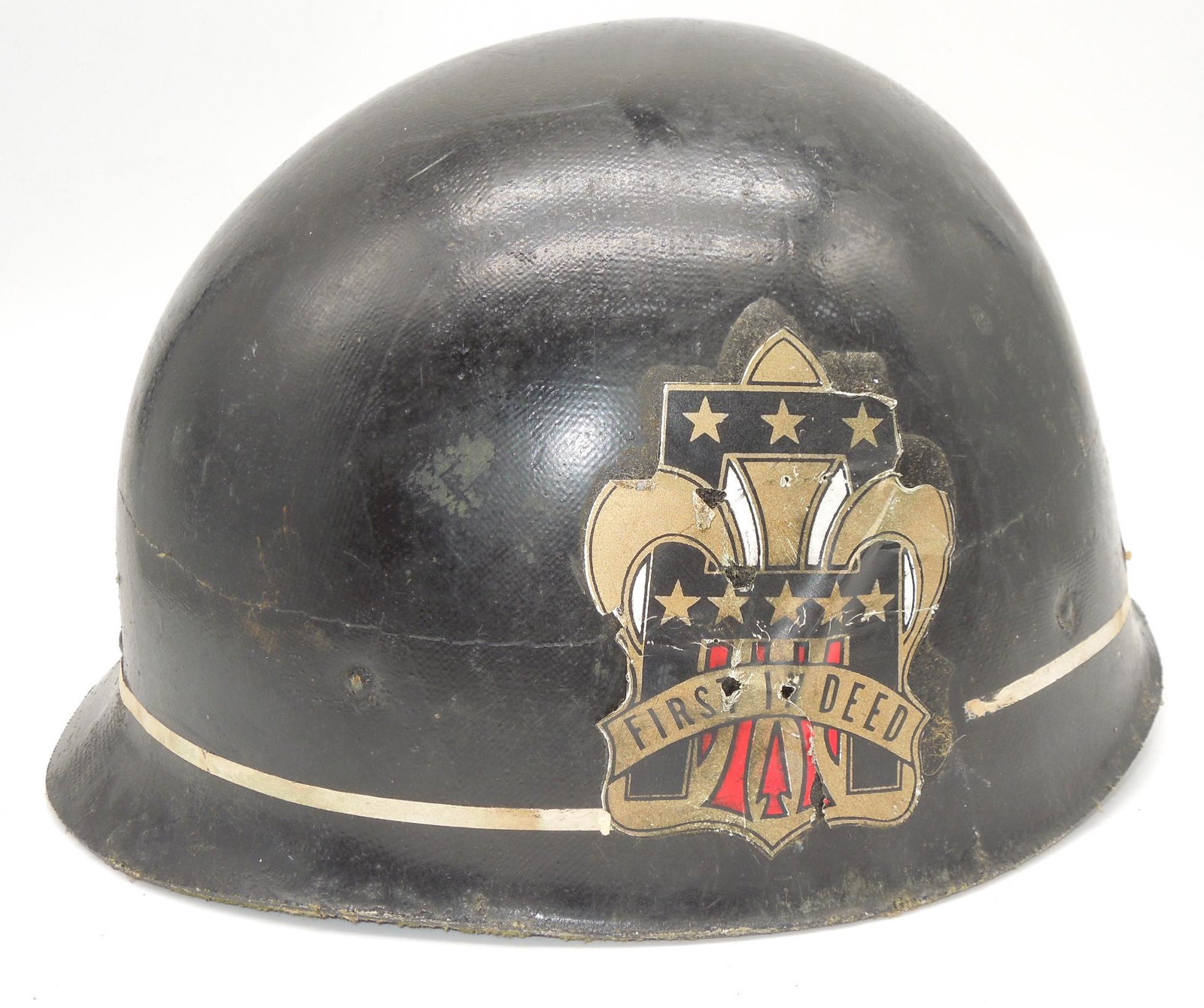 1960s US Army Iowa NCO Course M-1 Helmet Liner & Decals: US Army Vietnam War era First Army and First In Deed decaled M-1 helmet liner, with IANCOA (Iowa Non Commissioned Officer Academy) stenciled on the back. Good, but used condition.