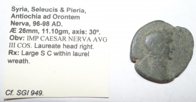 NERVA Caesar Syria S-C Ancient Roman Coin: NERVA Caesar Syria Large S-C within Laurel Wreath Ancient Roman Coin. See pictures for complete details. This item came from a long-time collector of ancient coins. It is being sold as is based on the