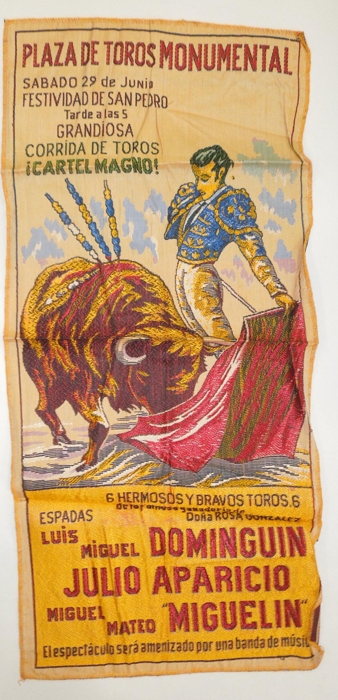 Bullfighting Matador Cloth Fabric Art Plaza De Toros Monumental Spain Banner Tapestry: This 26 x 12 inches banner / wall hanging is from the Plaza De Toros Monumental in Barcelona, Spain. This cloth banner features Miguel Dominguin and Julio Aparicio. The banner has bright colors and is
