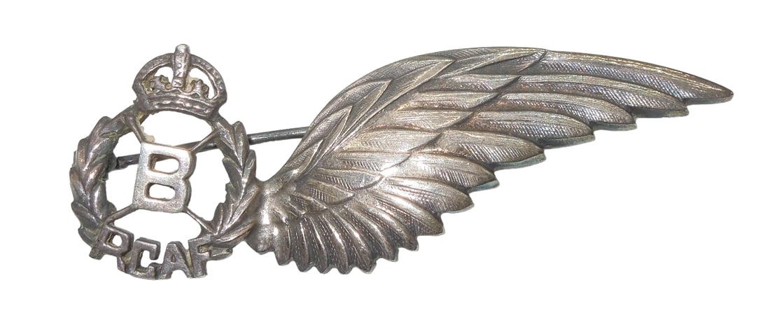 WWII Royal Canadian Air Force RCAF Sweetheart Sterling Bombardier Wing: Original WWII era sterling marked pin back home front Royal Canadian Air Force RCAF Bombardier half wing. Good condition.