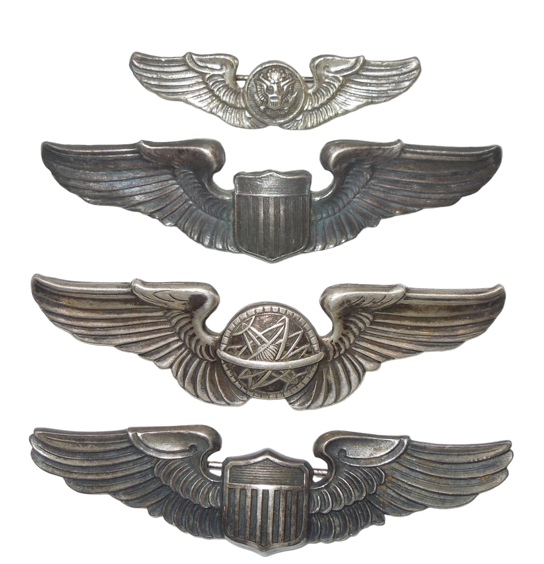 WWII US Army Air Force Lot (4) Sterling Wings: Lot of four wings- 2 inch Aircrew Sterling Meyer, 3 inch pilot Sterling (has pins but no clutches), 3 inch Navigator Sterling (one pin broken off but present, and no clutches), and 3 inch Pilot, unmar