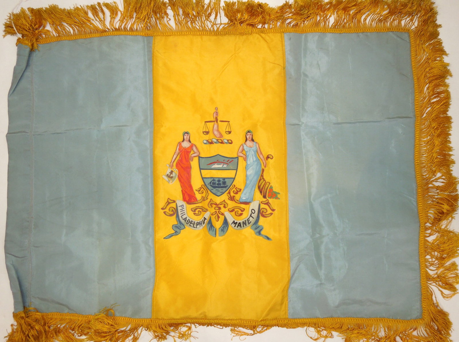 Circa 1920s City of Philadelphia, Pennsylvania Hand Painted Flag: Original hand painted City of Philadelphia Flag measuring approximately 21 x 27 inches. Some soiling from age. This was from the former Wanamaker Flag Collection. Lewis Rodman Wanamaker was the son of