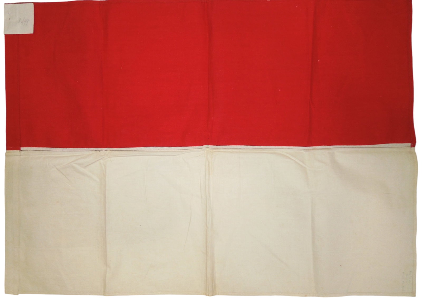 1950s Flag of Indonesia With Transmittal Letter: Original cloth flag sent to Dr. Clarence Rungee for his museum with a copy of the letter of transmittal. Unknown where the original version is. Note that the flag was incorrectly labeled Poland in one
