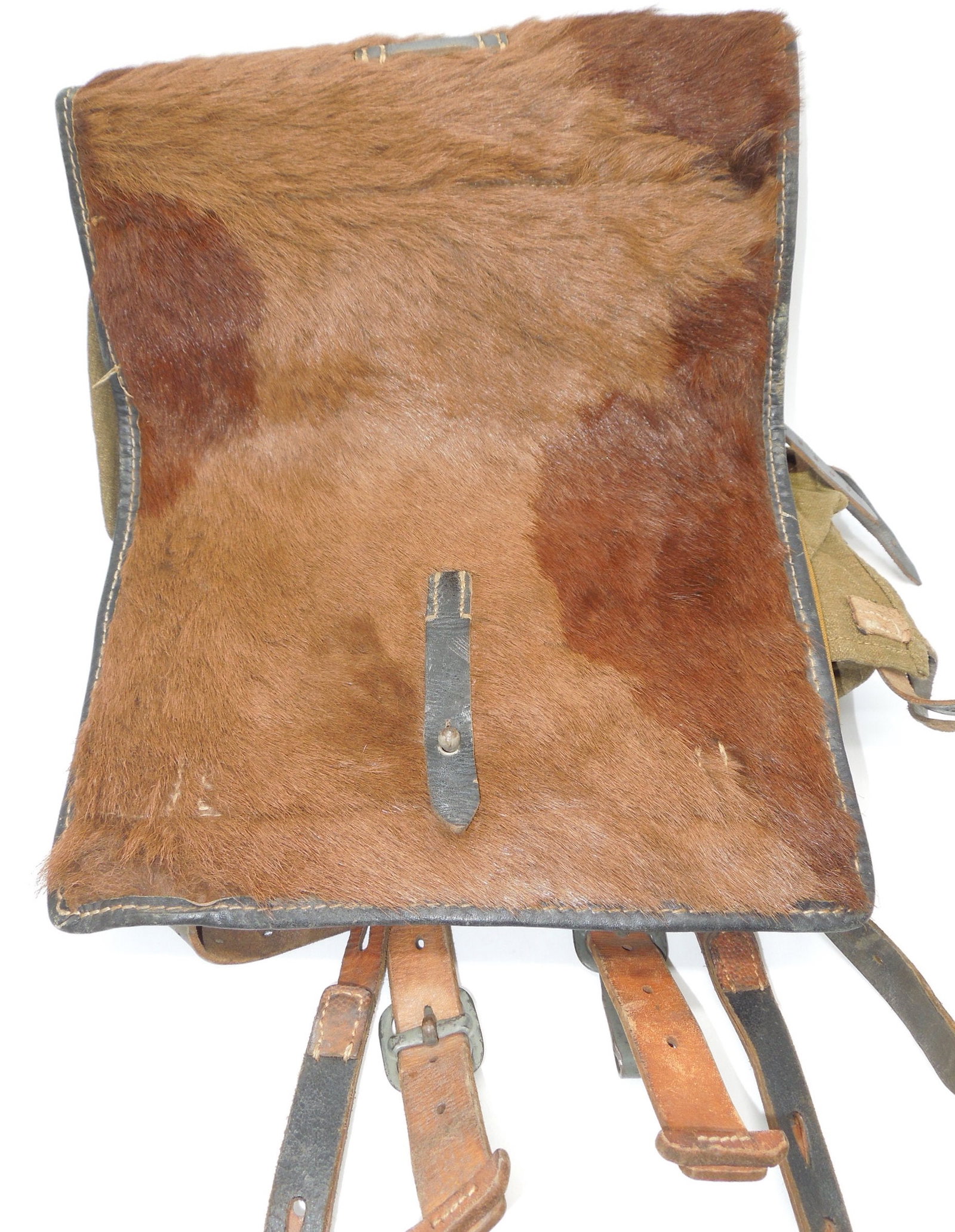 WWII German Wehrmacht 1943 Dated Fur Field Pack: German WWII 1943 backpack is in excellent condition. The item number on the back of the backpack is 0/04B6/002 and it has a fur front cover. Bringback from an infantry Company Commander in the 30th In