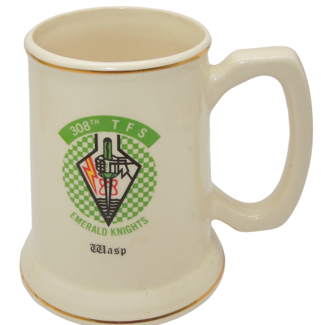 Vietnam War 1960s USAF 308th Tactical Fighter Squadron TFS Emerald Knights WASP Mug: 1960s 308th T.F.S. Tactical Fighter Squadron Emerald Knights WASP Mug. The 308th T.F.S. flew F-16s. Approximate size is 5.5 inches tall. Manufactured by Queens China Co. Nice overall condition.