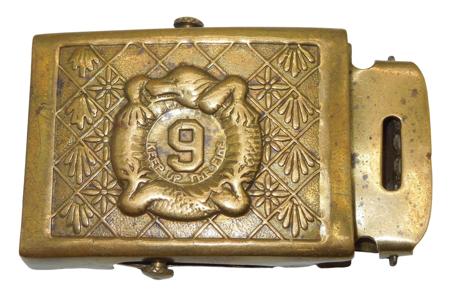 WWII US Army 9th Infantry Regiment DUI Insignia Belt Buckle: Army 9th Infantry Regiment Distinctive Unit Insignia (DUI) Belt Buckle. Keep Up The Fire Manchu. No maker mark seen. Good condition for its age.