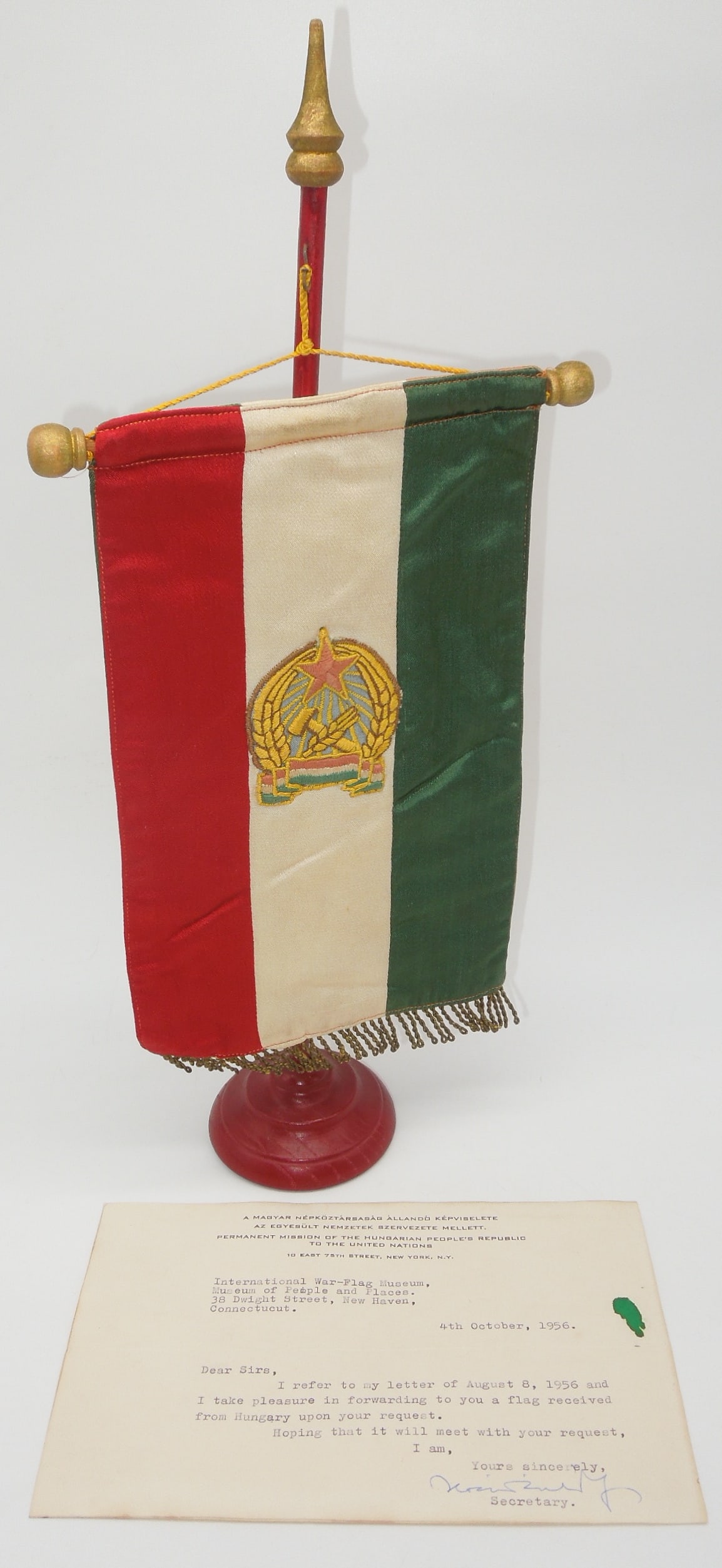 1956 Dated Communist Hungary Desk Flag & Letter From UN Representative: Original Dr. Clarence Rungee collection flag. Measures 12 inches by18 inches. Used condition. With inventory sheet and original 1956 letter.