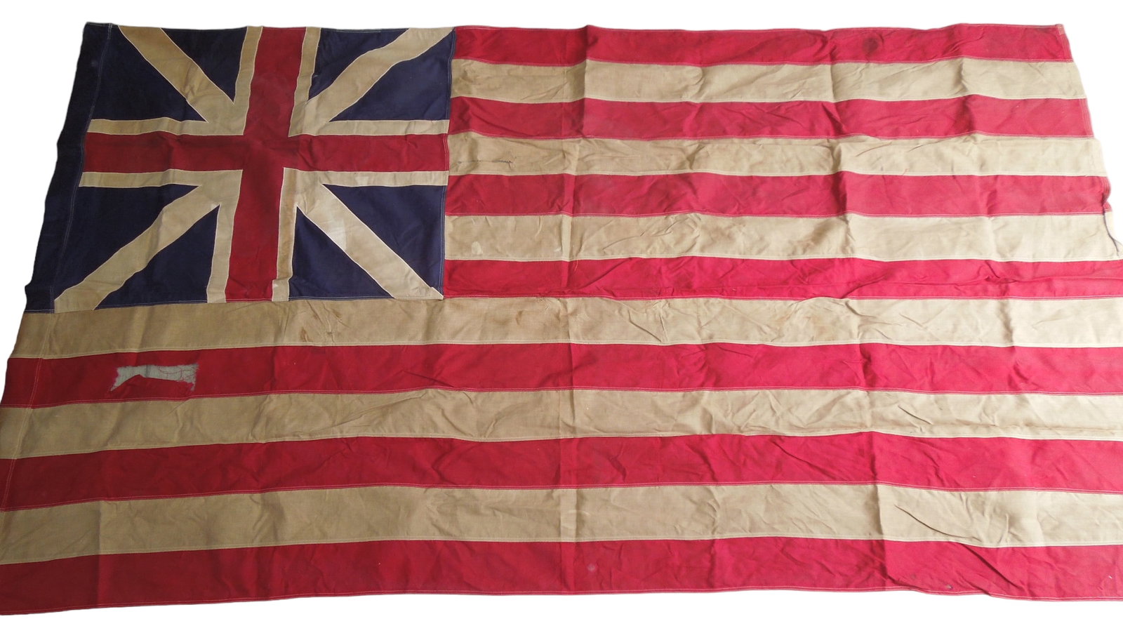 Circa 1876 US Continental Colors Grand Union Flag: Original flag measuring 93 by 57 inches. Good condition with some tearing and fraying consistent with age.