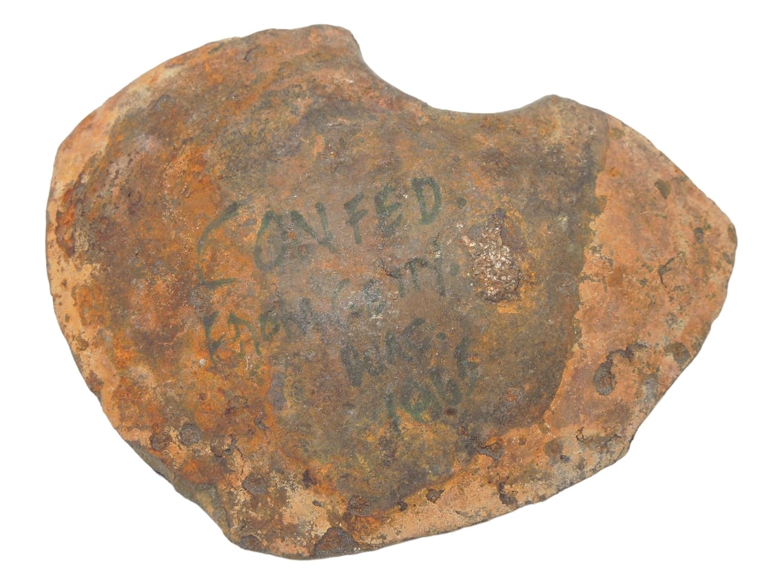 Civil War Confederate Cannon Ball Piece Dug At Gettysburg 1865: Piece of a cannon ball that has markings on it reading: Confed. From Getty. (unknown word) 1865. Rusty condition.