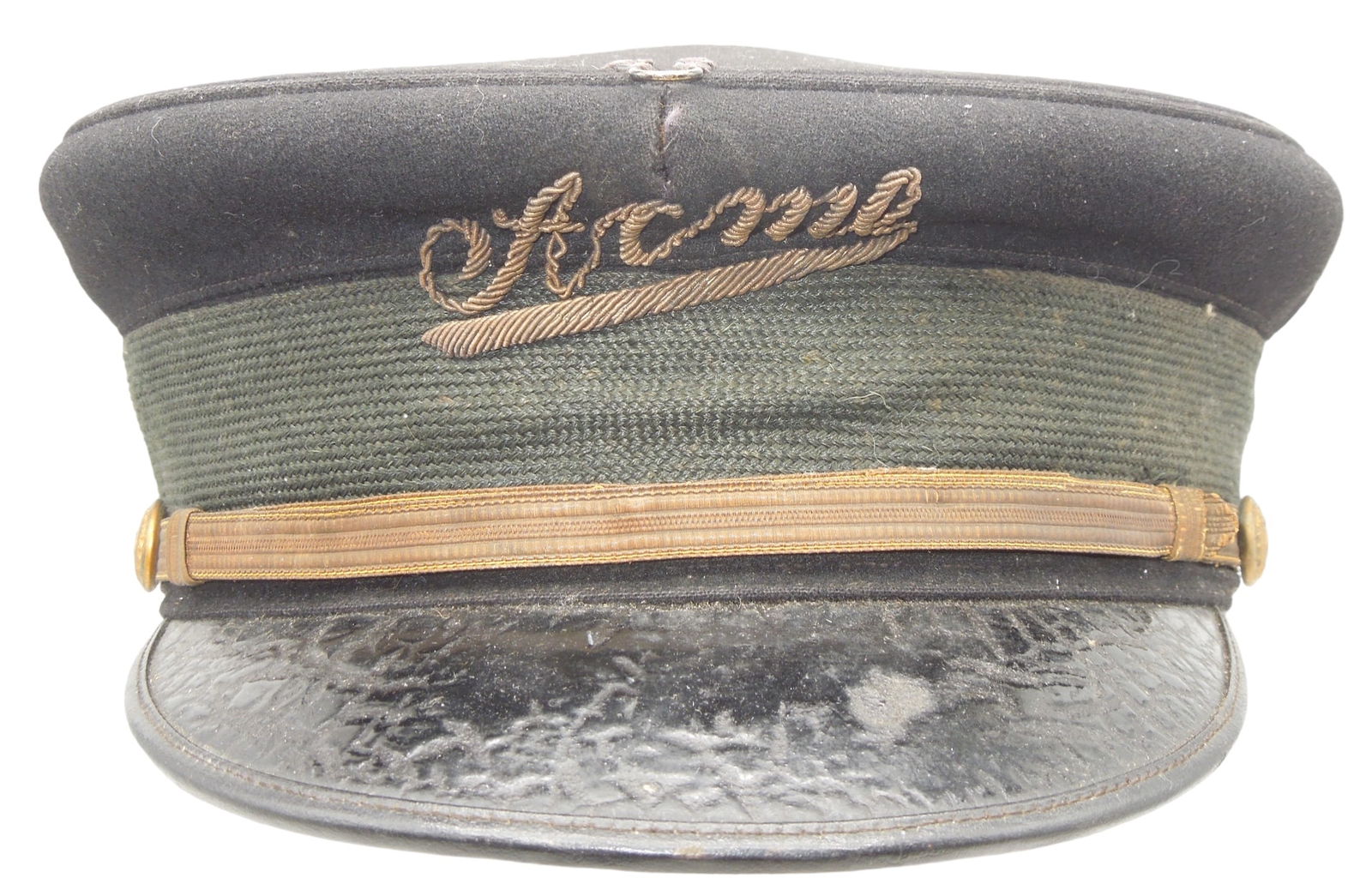 Early 1900s Acme Band Uniform Visor Cap Hat: Early 1900s Acme Band visor cap with a bullion ACME on the front. The top front of the cap has a hook sewn to it, possibly for a plume attachment. The inside is named to Paul Kochenberger, and made by