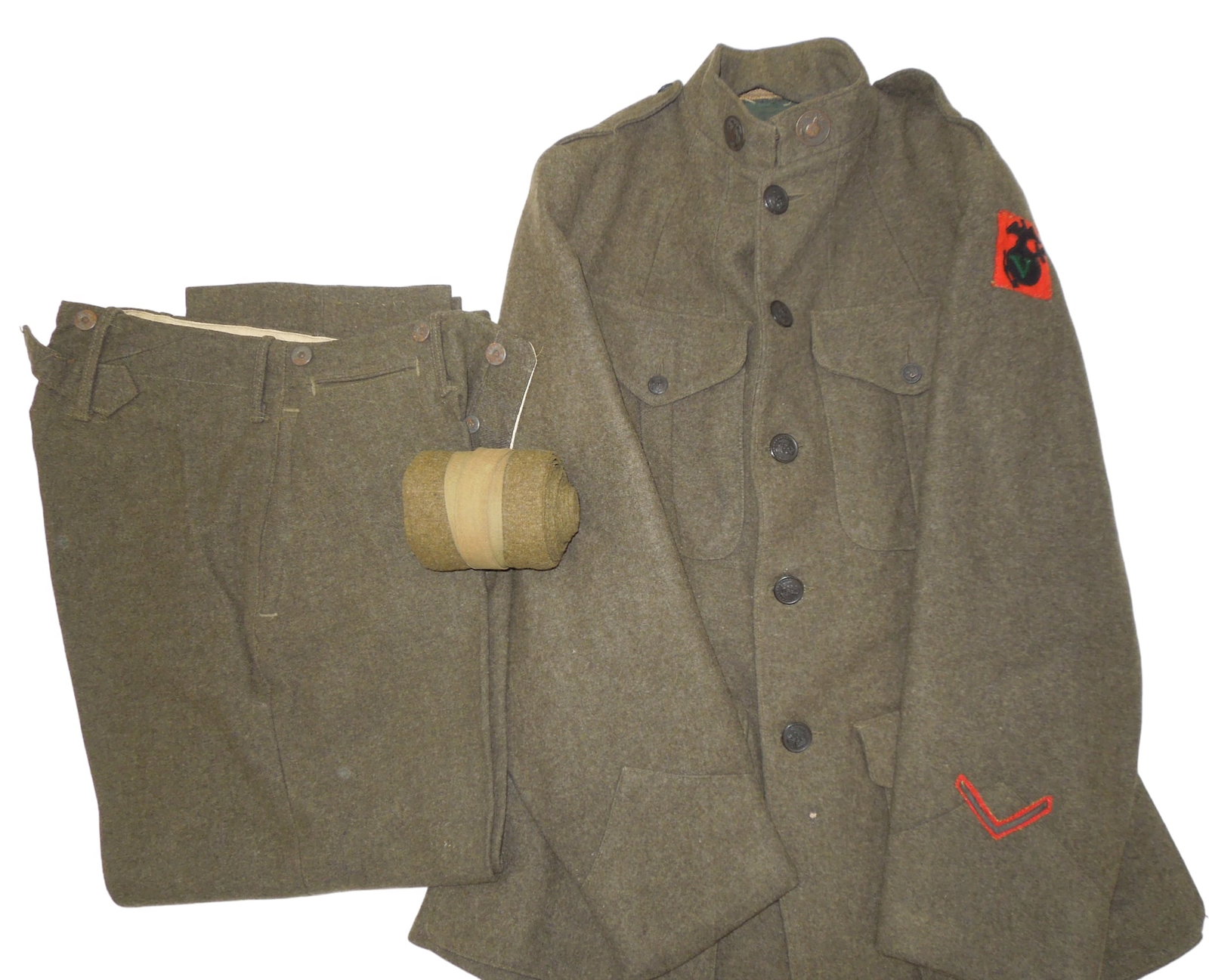 WWI Era USMC Marine Corps 5th Marine Brigade Uniform Jacket, Pants & Puttee: WWI USMC 5th Marine Brigade Uniform Jacket, Pants & Puttee Legging Wrap. Screw back collar discs. The uniform is not named or marked with a size. Nice condition for its age with a couple small moth ni