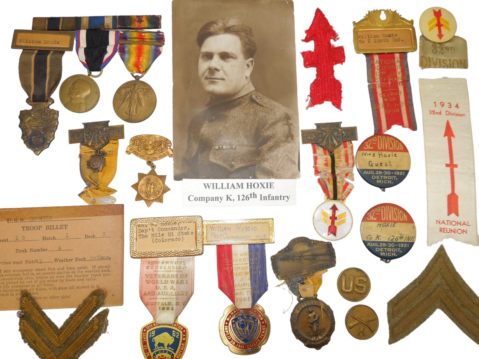 WWI US Army Named 32nd Division Infantry Medal & Patch Group: Group of medals, photo, patches to William Hoxie, 126th Infantry Regiment in the AEF France during WWI. Many reunion medals as well. Also a small silk 48 star flag. Good condition for its age.