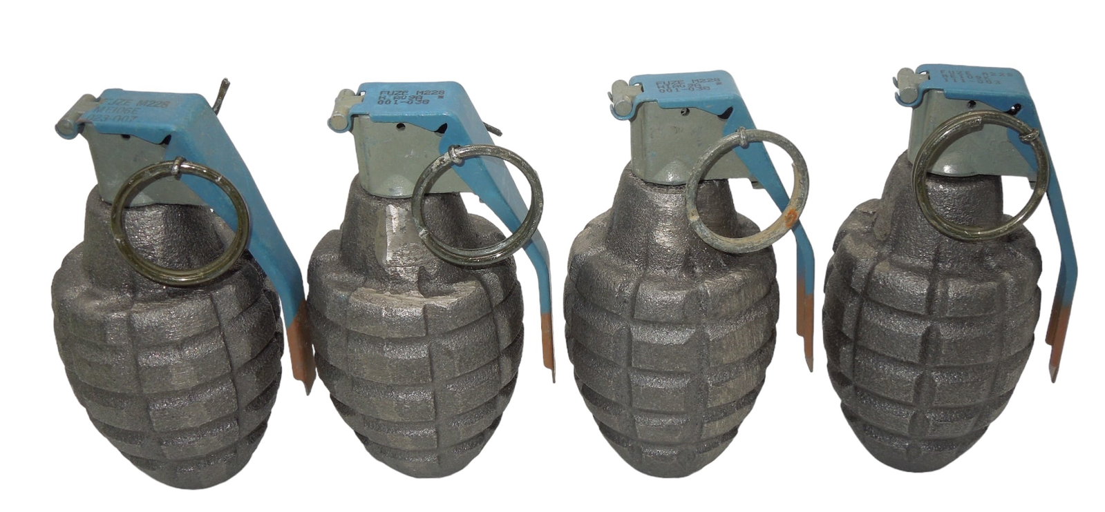 Lot (4) US Military Inert Training Grenades: Lot of four empty training grenades with removable fuze and spoon parts.