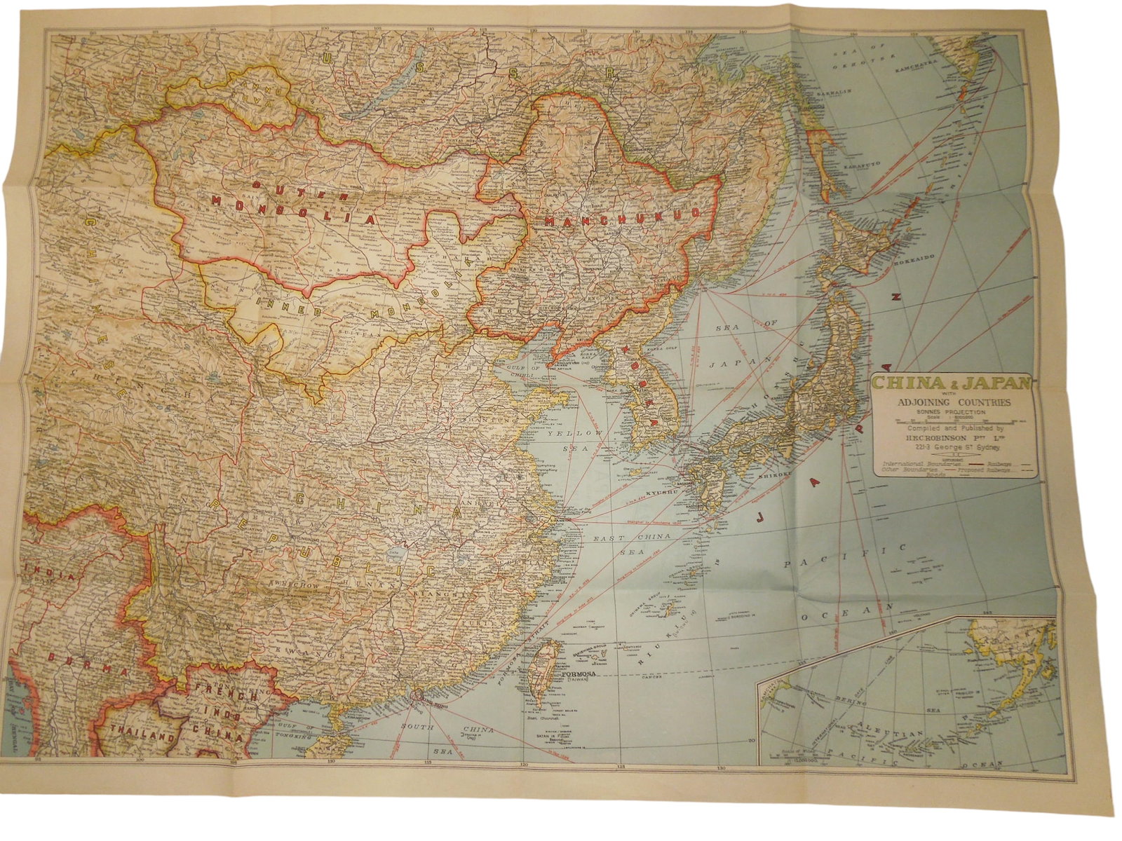 WWII China Mapped With Japan HEC Robinson Sydney War Map: Original WWII era map of China, Japan, and surrounding areas measuring approximately 30 by 40 inches. Folds to a smaller size with a cover.