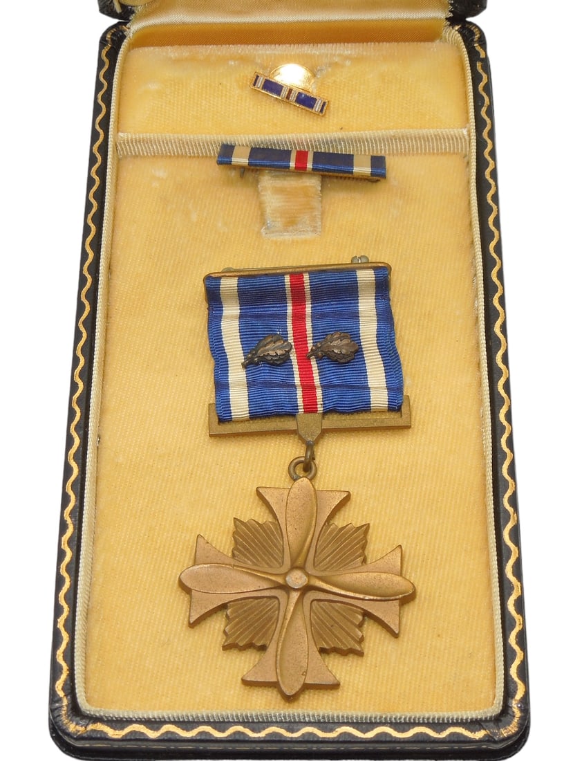 Vietnam Era Issued WWII Navy Style Named Distinguished Flying Cross DFC Medal: Vietnam Issued WWII Navy Style Named Distinguished Flying Cross DFC Medal. Named and engraved to Army WO4 Robert J. Filipowski. Filipowski served in Korea and Vietnam. This medal with two oak leaf clu