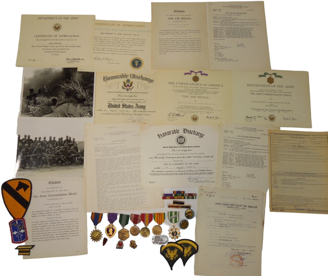 Vietnam War Army 1st Cavalry Division Soldier Purple Heart Air Medal & Document Archive: Vietnam 1st Cavalry Division group to Sgt. Randall E. Burley consisting of his award documents, certificates, two very nice 8 x 10 inch photos of his unit, paperwork for a captured war trophy rifle he