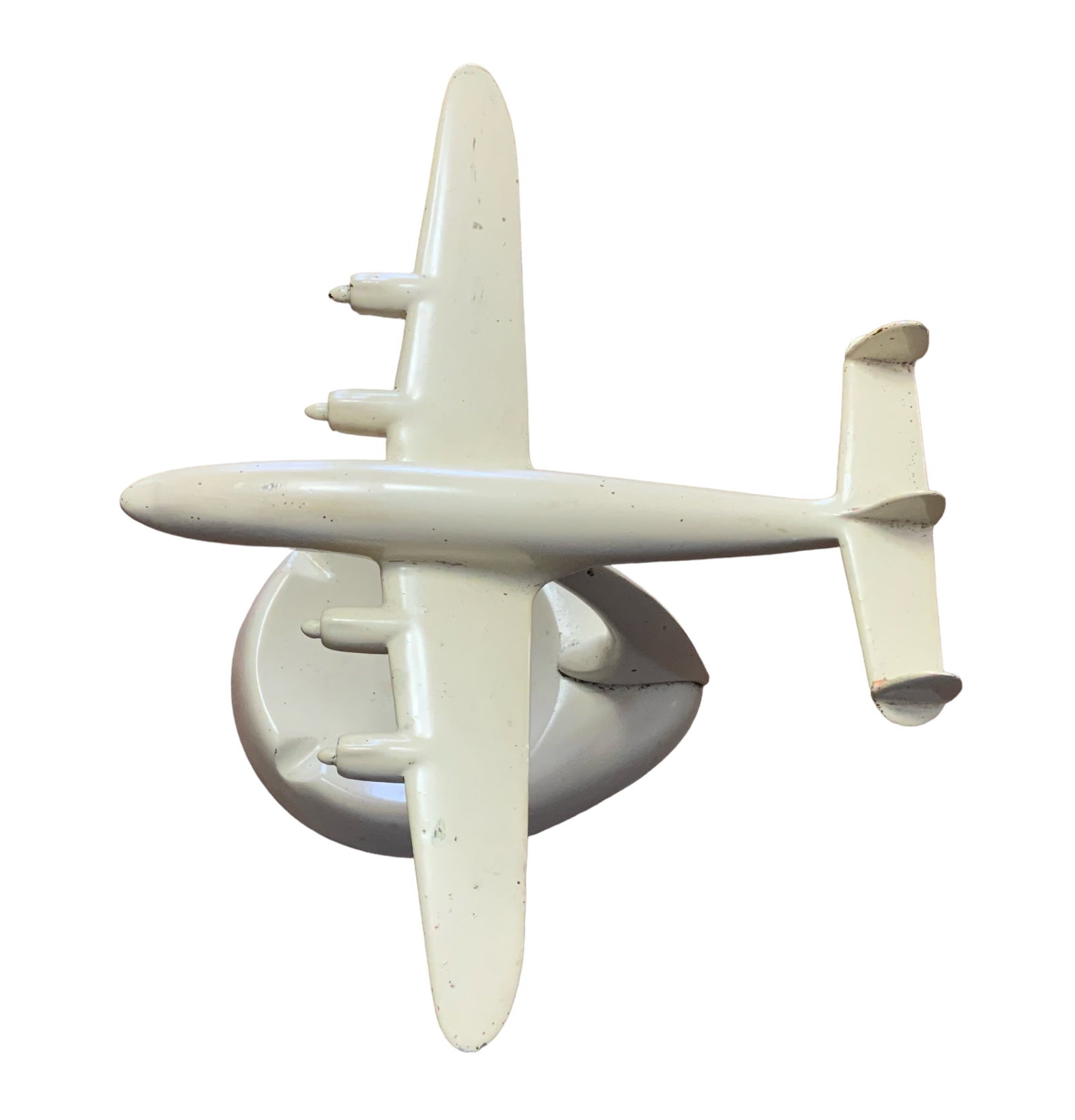 WWII Lockheed Constellation Troop & Cargo Transport Metal Ashtray: WWII Lockheed Constellation Cargo Troop & Transport Metal Ashtray. Approximate size is 8.25 inches long and 7.5 inches tall. It looks like there are white paint chips throughout the piece. Otherwise, 