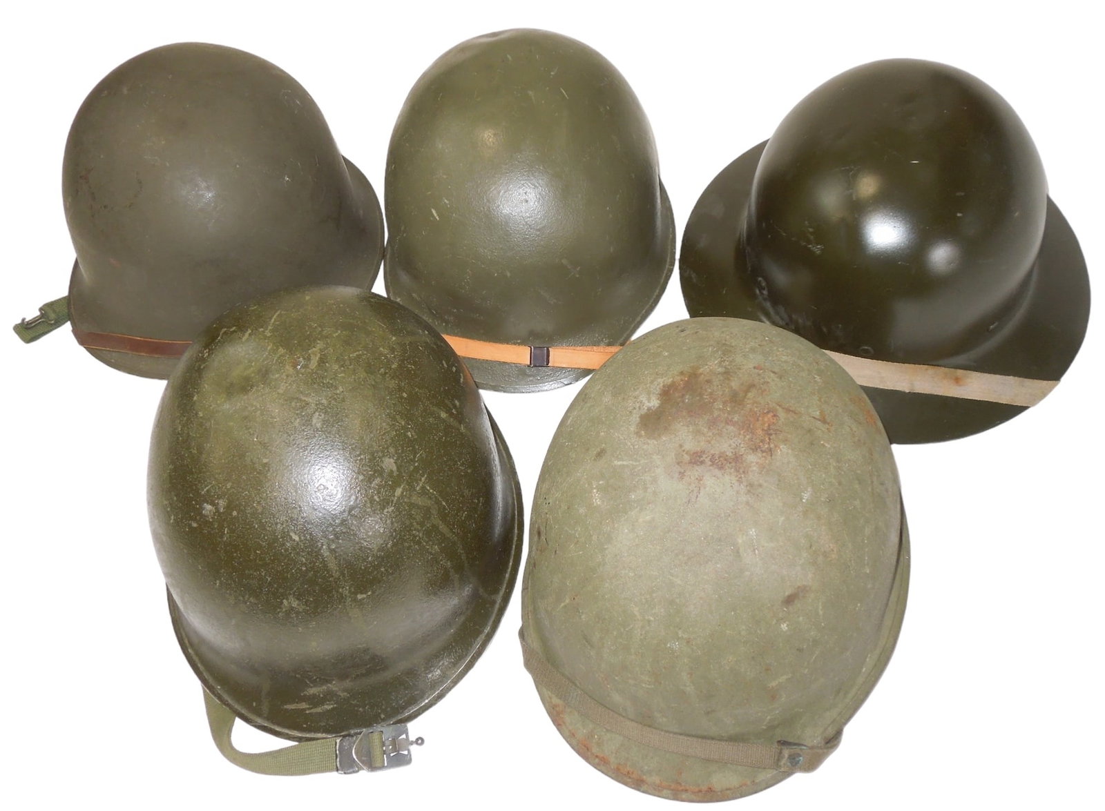 Lot (5) WWII - Cold War European Helmets & Liners: Lot of five military helmets. One bears a West German flag from the Cold War era, another may be a Civil Defense modified piece. All are in fair to good condition with expected wear.