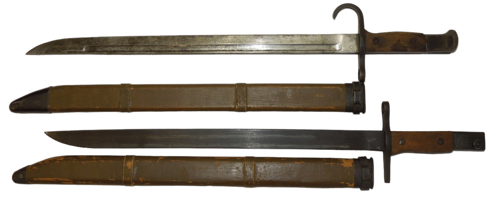 Lot (2) WWII Japanese Army Last Ditch Bayonets & Wooden Scabbards: Two original bayonets with the end of war style Last Ditch wooden scabbards, due to shortages of metal. One is a Hikari Seiki Seisaku-Jo arsenal, and the other is a Toyoda Jido Shokki Seisaku-jo arsen