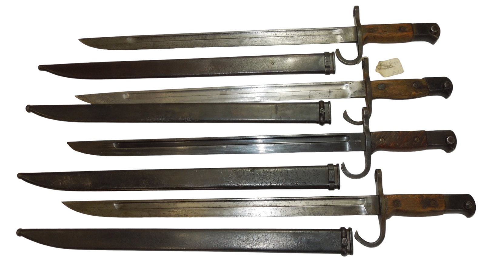 Lot (4) WWII Japanese Army Type 30 Bayonets & Scabbards Kokura Arsenal, National Denki: WWII Japanese Army Type 30 Bayonets & Scabbards. Lot of (4). These are the type 30 Hooked Quillon bayonets. Based on our research we found the following makers of these bayonets. (2) Kokura Arsenal 19