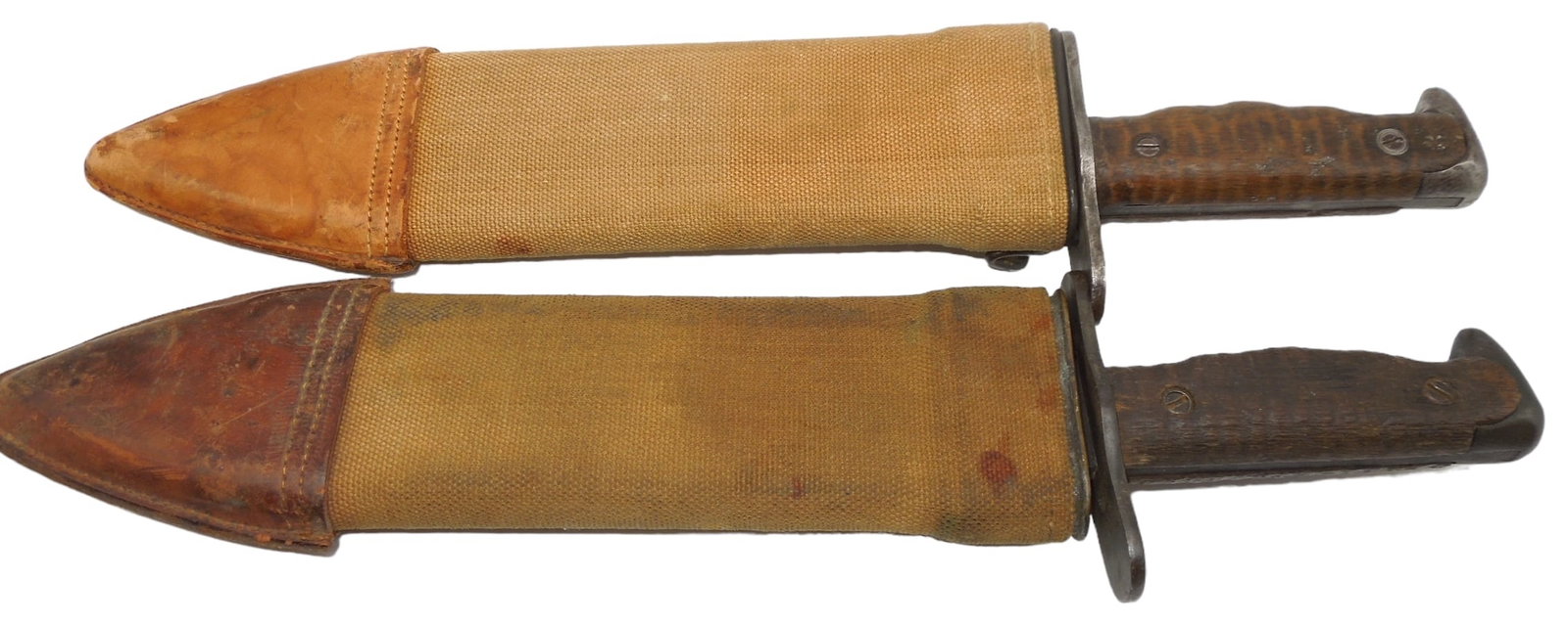 Lot (2) WWI US Army 1918 Plumb Bolo Knives & Canvas Scabbards: Lot of two US Army bolo knives and canvas scabbards. Good condition showing wear consistent with age.