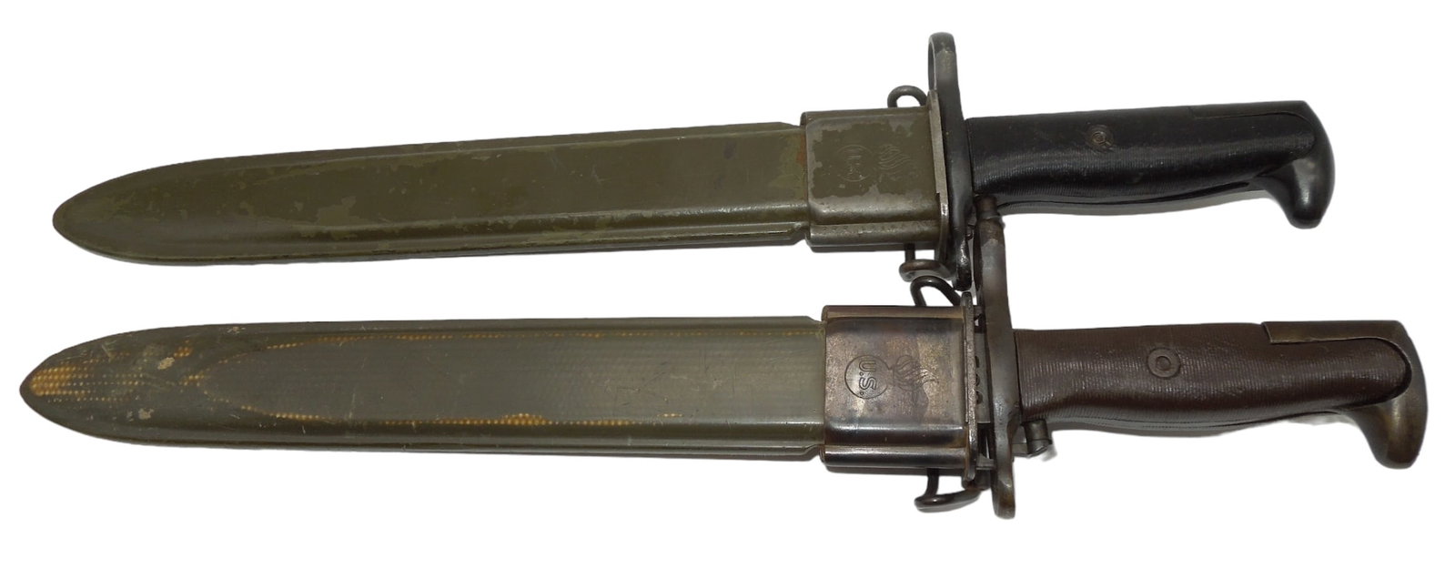Lot (2) WWII US Army M-1 Garand AFH Bayonets & Scabbards: Two AFH (American Fork & Hoe) marked WWII M-1 Garand Bayonets. Both show some wear consistent with age to include minor paint loss on the scabbards.
